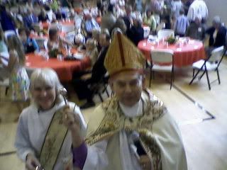 StarKnight Deacon Ane gets a good laugh while Bishop Hugo gets my cassock and cotta with holy water--best laugh of the afternoon!!